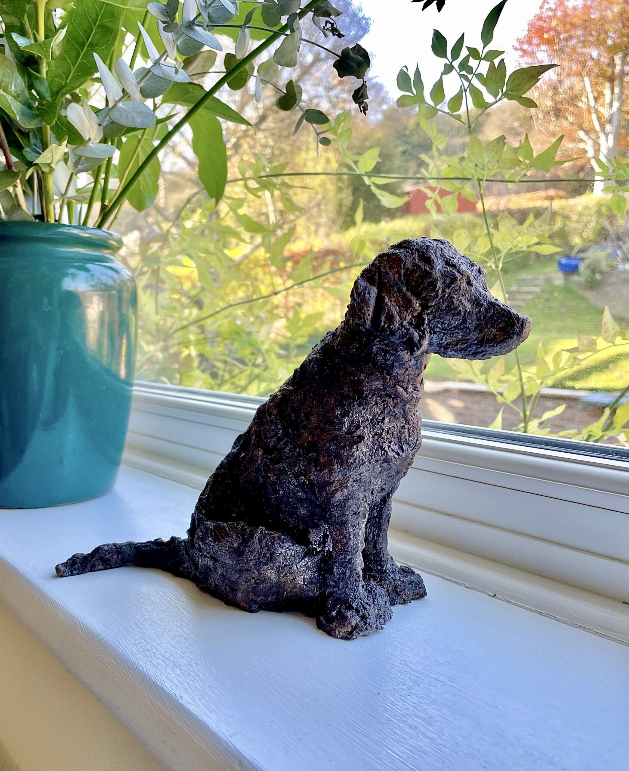 Maisie — bronze memorial sculpture of a black dog